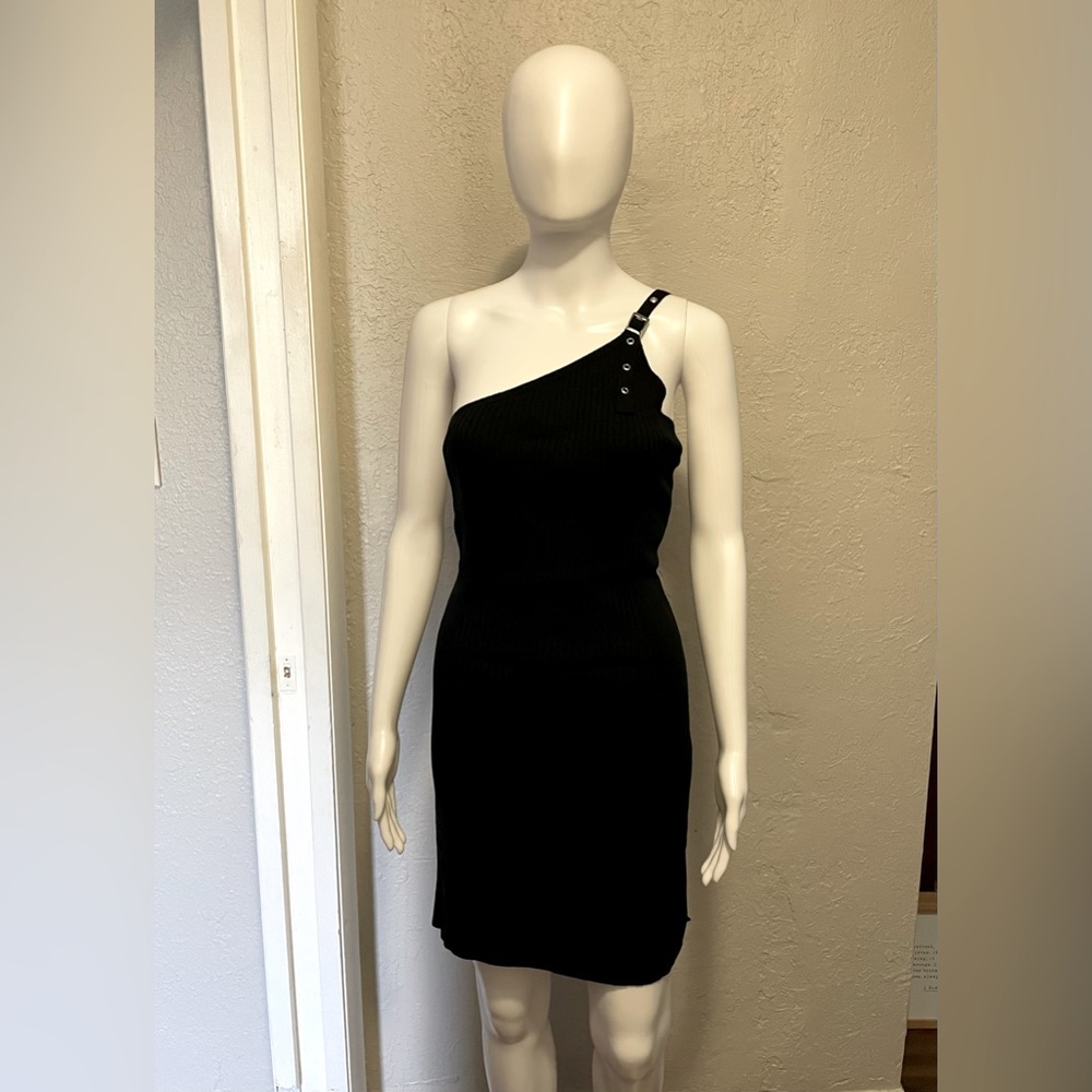 Black one shoulder strap dress.